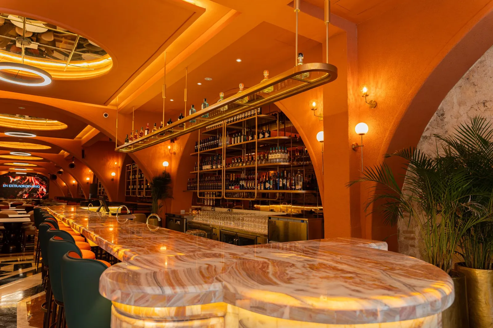Detail of the onyx bar and the liquor shelves